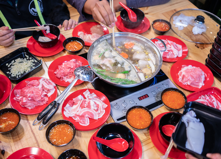 Thai Hot pot soup or Shabu on the table in restaurant .の写真素材
