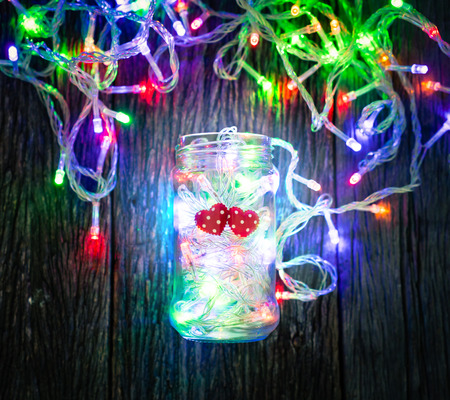 Valentines Day background with hearts and light in the bottle.の写真素材