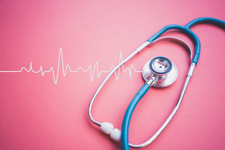Stethoscope and Heartbeat Line on pink background,Healthcare concept.の写真素材