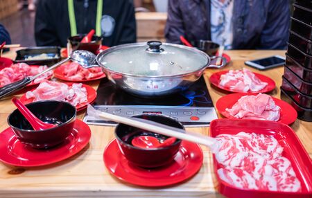 Thai Hot pot soup or Shabu on the table in restaurant.の写真素材