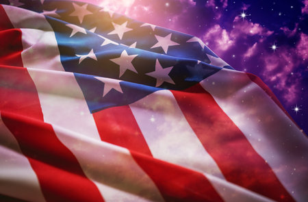 American flag with night sky background.