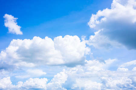 Blue sky with beautiful white clouds background.の写真素材