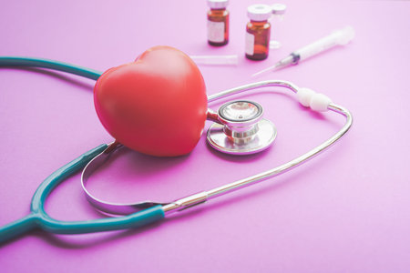 Heart and stethoscope with syringe and drug,Healthcare concept.