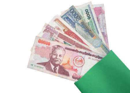 Laos money kip banknotes in green envelope isolated on white background.の写真素材