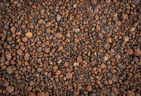 Laterite soil textured background a small cube in the mountains.