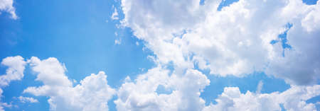 Panorama Blue sky background with clouds in summerの写真素材