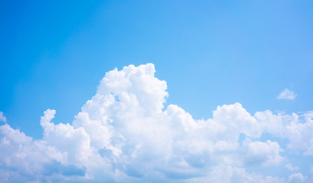 Blue sky and white clouds nature background.の写真素材