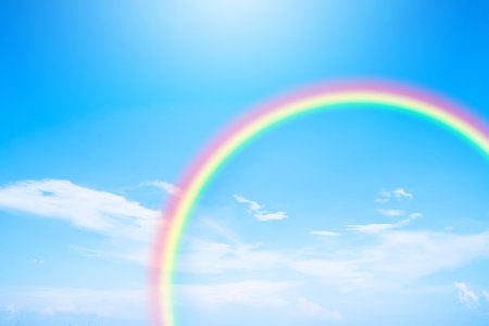 Beautiful rainbow and Blue sky with cloud in summer day.の写真素材