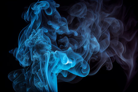 Abstract texture of Blue smoke on a dark black background.の素材