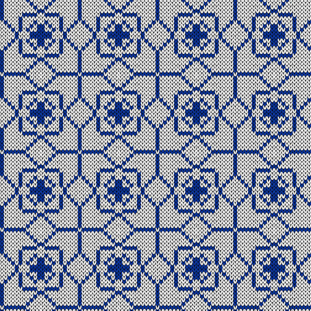 Geometrical ornate seamless knitted vector pattern as a fabric texture in blue and white huesのイラスト素材