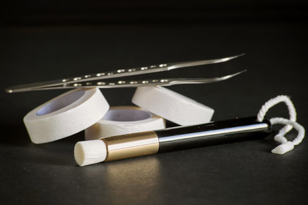 equipment for eyelash extensions on a dark background.の写真素材