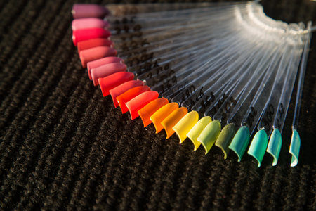 palette of gel Polish colors on a black background.