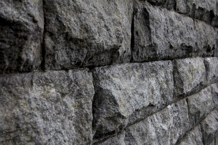Gray stone wall. Textured background closeup. Abstractionの写真素材