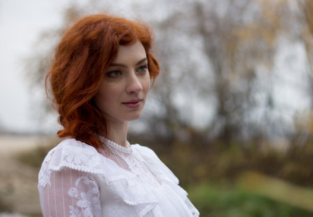 Beautiful young woman with red hair. Portrait. Close-up.のeditorial素材