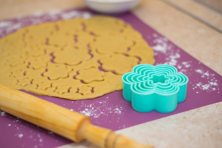 Homemade bakery making, gingerbread cookies in form of Christmas tree close-up. New year treat for...
