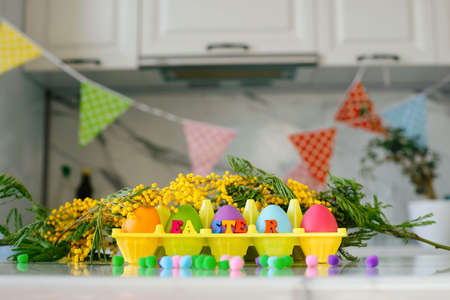 Letters Easter Background Colored Eggs. Postcard. Family Tradition Concept. Selective focusの写真素材