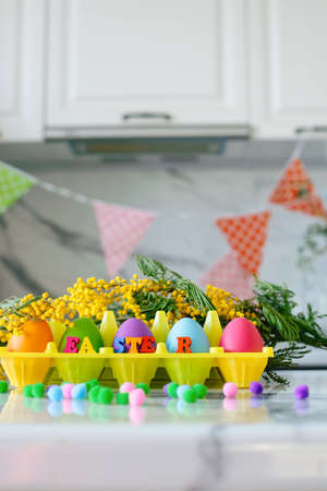 Letters Easter Background Colored Eggs. Postcard. Family Tradition Concept. Selective focusの写真素材