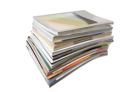 Stack of magazines isolated on white
