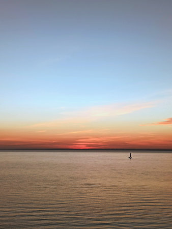 sunset, sea, sun, water, sky, ocean, sunrise, lake, landscape, nature, clouds, beach, orange, boatの写真素材