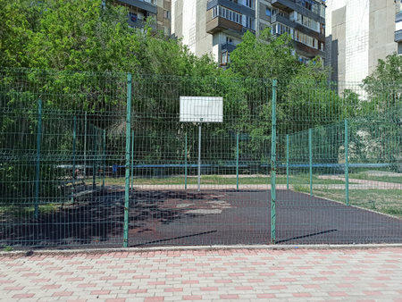 building, architecture, field, soccer, sport, street, grass, park, road, goal, green, footballの写真素材