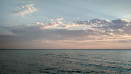 Beautiful sunset over the sea. View from the sea to the horizon.の写真素材