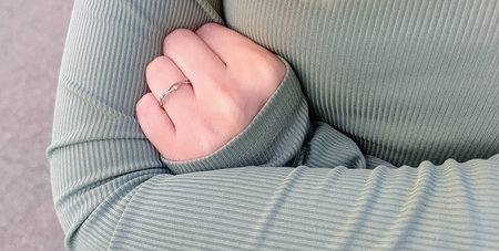 Closeup of a woman's hand with a ring on her finger