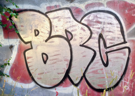 Graffiti on the wall. Abstract background image of a street art graffiti. Urban Contemporary Cultureの写真素材