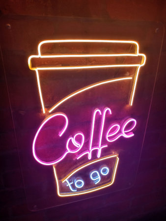 Coffee shop neon signboard with cappuccino cupの写真素材