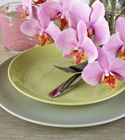 serving with orchidの写真素材