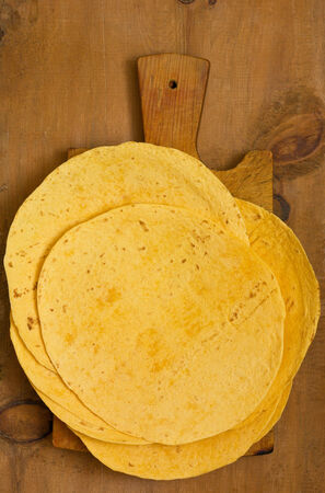 Stack of  Flour Tortillas on a wooden backgroundの写真素材