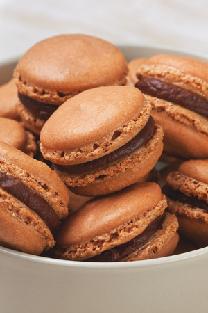 macaroon with chocolate cream in a bowl. selective focusの写真素材