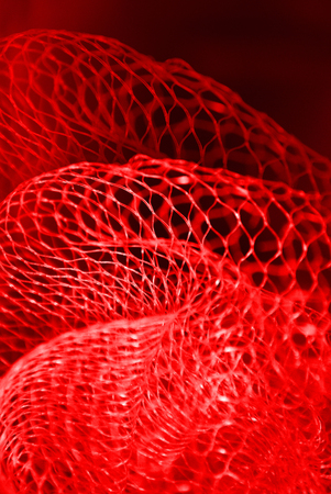 Abstract red background. Waves. Threadsの写真素材
