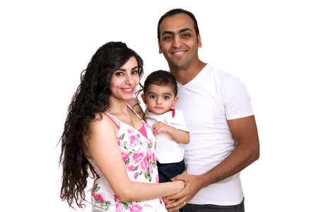 Studio portrait of a young family on a white background. High quality photoの写真素材