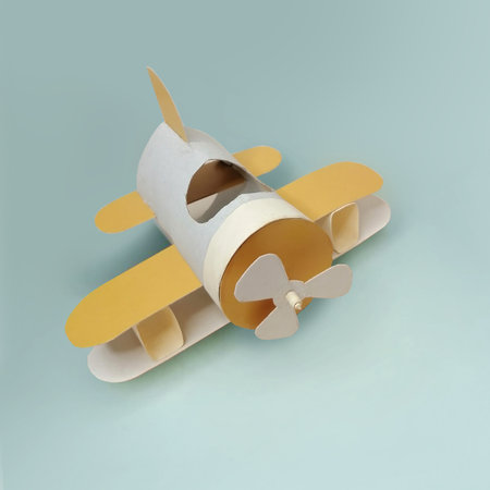 The idea of recycling a roll of toilet paper into a toy airplane. Craft idea for childrens creativityの写真素材