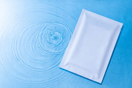 Rectangular white cosmetic packaging with place for textの写真素材