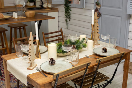 There is a Christmas table, setting in natural style, top view