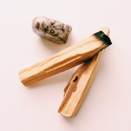 Natural incense Palo Santo. Sacred tree of South America, color square photo. Palo Santo on white background.の写真素材