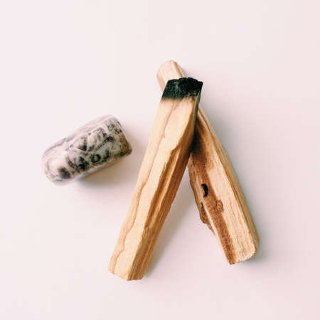 Natural incense Palo Santo. Sacred tree of South America, color square photo. Palo Santo on white background.の写真素材