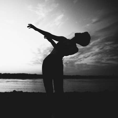 Silhouettes of Beautiful Girl, Black and white art fashion surrealistic portraitの写真素材