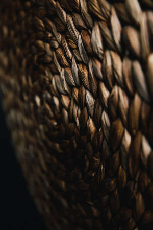 Straw wicker abstract background, straw wicker beige eco friendly spiral abstract background spaceの写真素材