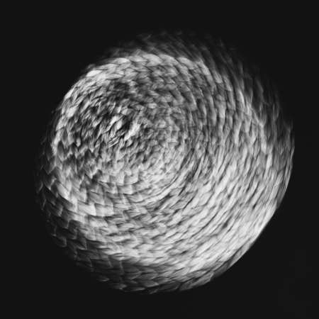 Straw wicker abstract background, straw wicker beige eco friendly spiral abstract background spaceの写真素材