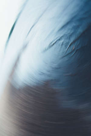 Close-up of water texture, smooth blue waves of water on the shore beach, color landscape photo of water.Smooth and beautiful waves on the beach. The texture of the water in Icelandの写真素材