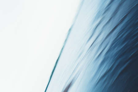 Close-up of water texture, smooth blue waves of water on the shore beach, color landscape photo of water.Smooth and beautiful waves on the beach. The texture of the water in Icelandの写真素材