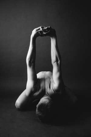 a person practices yogaの写真素材