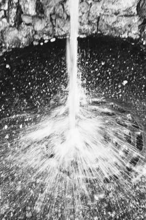 Close-up of water texture, smooth waves of water on the shore, landscape photo of waterの写真素材