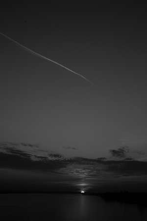 Close-up of water texture, smooth waves of water on the shore, landscape photo of waterの写真素材