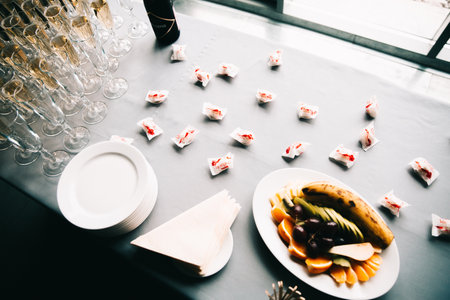 Color photo of the reception and banquet at the wedding, a beautiful wedding table with original food and snacks for the holidayの写真素材