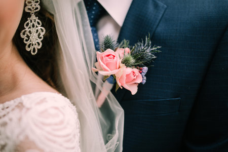 Color wedding photo, hands of husband and wife close-up, wedding ceremonyの写真素材