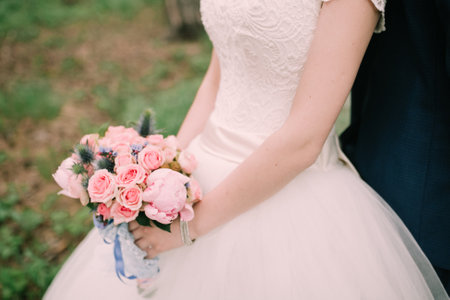 Color wedding photo, hands of husband and wife close-up, wedding ceremonyの写真素材