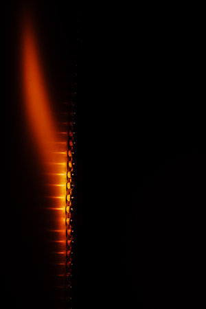 Minimalistic photography, orange beads lined up, geometry and perspective of round objectsの写真素材